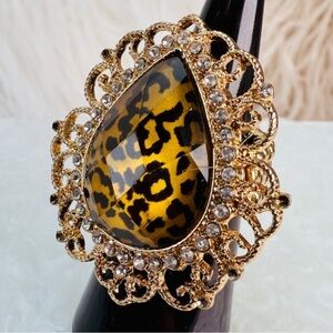 Gold tone, leopard print size 5 1/2 adjustable costume ring